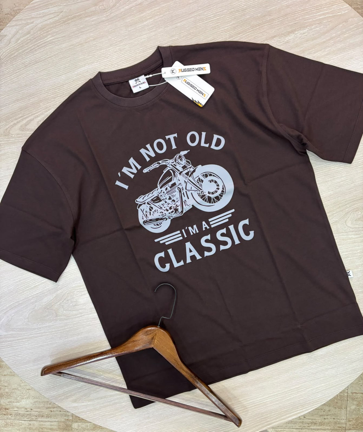Klassisk T-shirt i bomuld med cykelmotiv og droppede skuldre - mørkebrun
